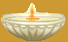 Single candle in a bowl.